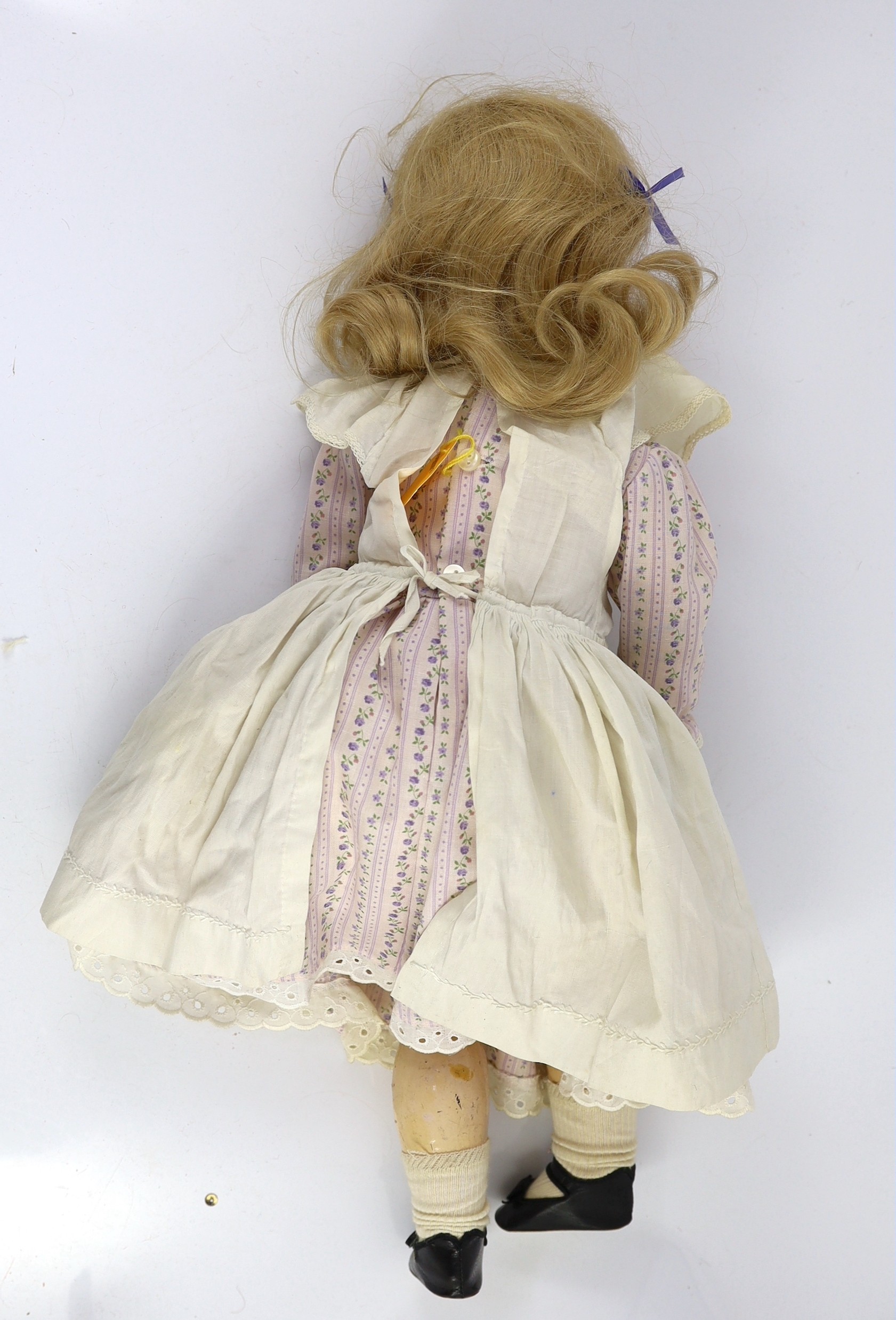 A Schoenau & Hoffmeister bisque doll, German, circa 1909, 21in.